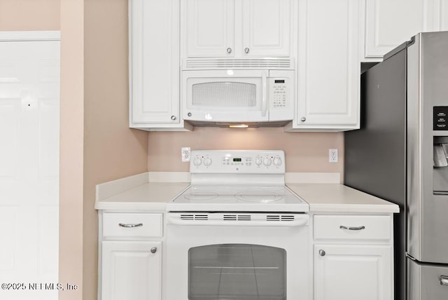 11251 Campfield Dr Unit 4107, Jacksonville, FL 32256 - kitchen with white appliances, light countertops, and white cabinets