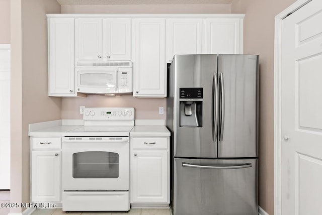11251 Campfield Dr Unit 4107, Jacksonville, FL 32256 - kitchen featuring white appliances, light countertops, and white cabinets