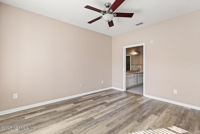 11251 Campfield Dr Unit 4107, Jacksonville, FL 32256 - spare room with ceiling fan, wood finished floors, and baseboards