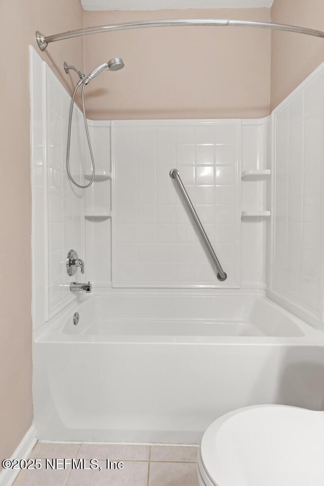 11251 Campfield Dr Unit 4107, Jacksonville, FL 32256 - bathroom featuring toilet, bathing tub / shower combination, and tile patterned flooring