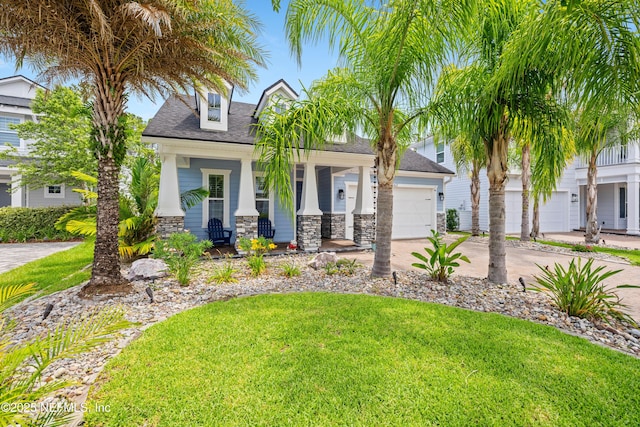162 Parkbluff Cir, Ponte Vedra, FL 32081 - view of front of house with driveway, covered porch, a front yard, and stone siding