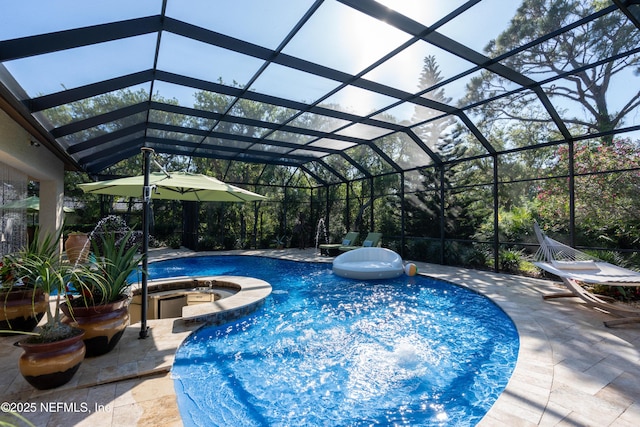 8 Rue Renoir, Palm Coast, FL 32137 - view of pool featuring a pool with connected hot tub, a patio area, and glass enclosure