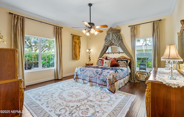 8 Rue Renoir, Palm Coast, FL 32137 - bedroom featuring ornamental molding, dark wood-style floors, baseboards, and ceiling fan