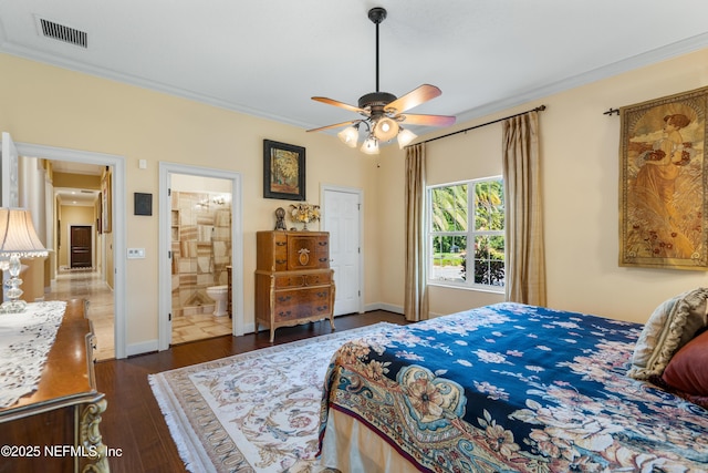 8 Rue Renoir, Palm Coast, FL 32137 - bedroom featuring crown molding, dark wood finished floors, ensuite bathroom, baseboards, and ceiling fan