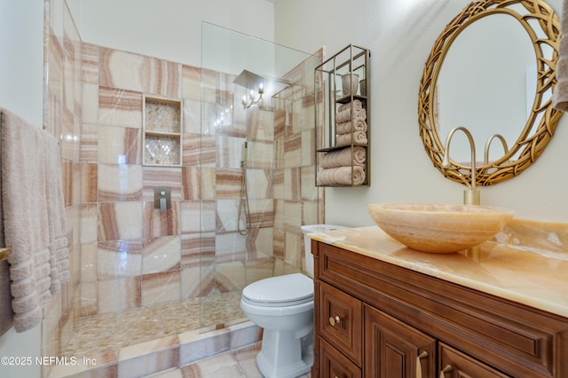 8 Rue Renoir, Palm Coast, FL 32137 - bathroom with toilet, vanity, a walk in shower, and a chandelier