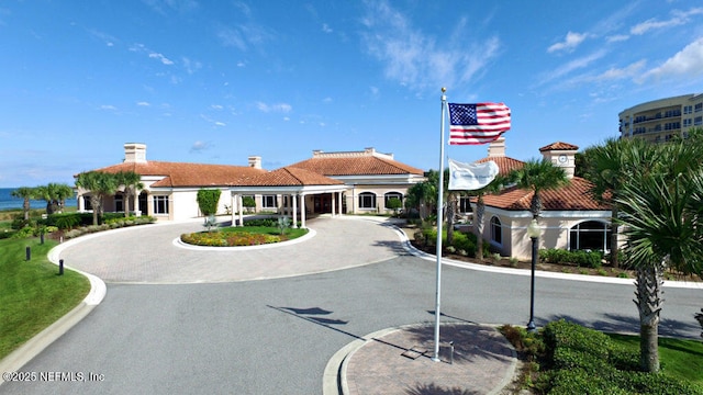 8 Rue Renoir, Palm Coast, FL 32137 - view of building exterior featuring curved driveway