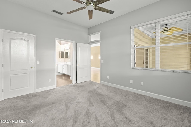 1141 Glengad, Ormond Beach, FL 32174 - unfurnished bedroom featuring carpet, ensuite bathroom, and a ceiling fan