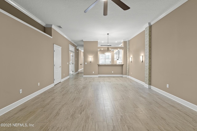 1141 Glengad, Ormond Beach, FL 32174 - unfurnished living room featuring ceiling fan, ornamental molding, light wood-style flooring, and a textured ceiling