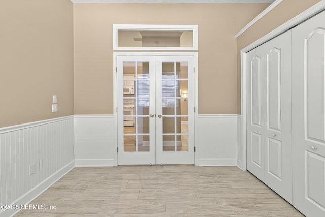 1141 Glengad, Ormond Beach, FL 32174 - doorway to outside with french doors and wainscoting