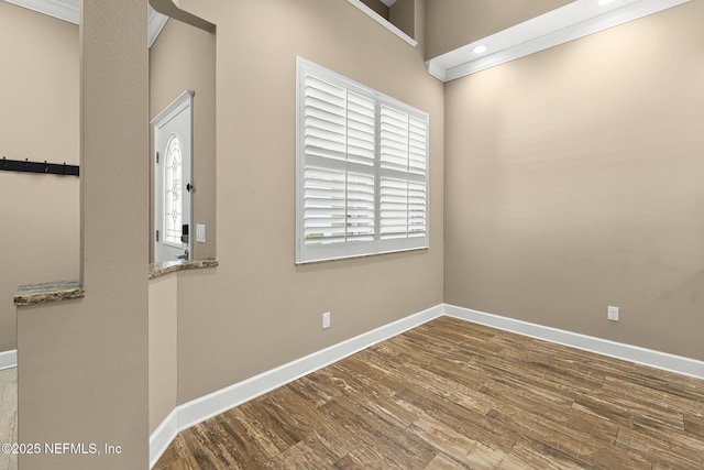 1141 Glengad, Ormond Beach, FL 32174 - unfurnished room featuring wood finished floors and baseboards