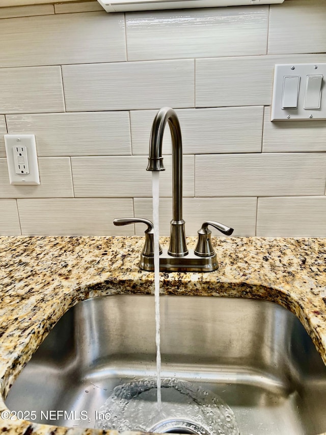 1141 Glengad, Ormond Beach, FL 32174 - kitchen view of decorative backsplash and light stone countertops