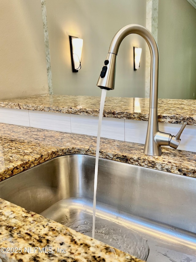 1141 Glengad, Ormond Beach, FL 32174 - kitchen view of a sink and light stone countertops