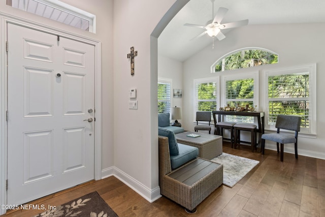 73 Amacano Ln, Saint Augustine, FL 32084 - entrance foyer featuring a ceiling fan, wood finished floors, lofted ceiling, baseboards, and arched walkways