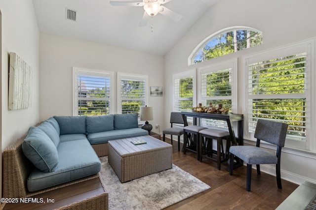 73 Amacano Ln, Saint Augustine, FL 32084 - living area featuring dark wood finished floors, ceiling fan, and high vaulted ceiling