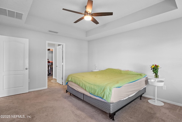 1929 Rock Springs Way, Middleburg, FL 32068 - bedroom featuring carpet floors, a raised ceiling, baseboards, and a spacious closet