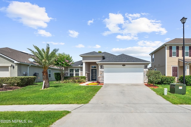1929 Rock Springs Way, Middleburg, FL 32068 - view of front of house with an attached garage, concrete driveway, a front yard, and stone siding