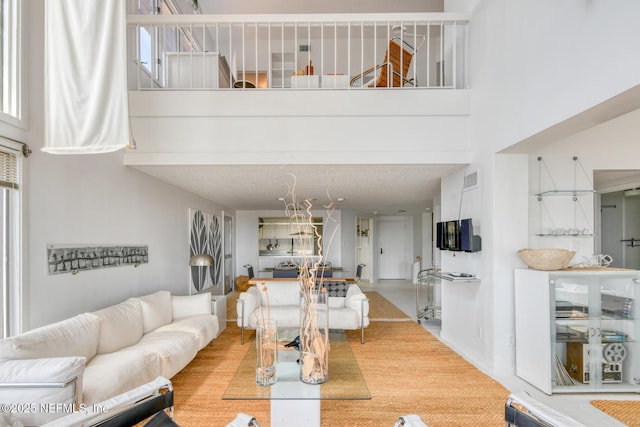3115 Harbor Dr, Saint Augustine, FL 32084 - living area with a high ceiling and baseboards