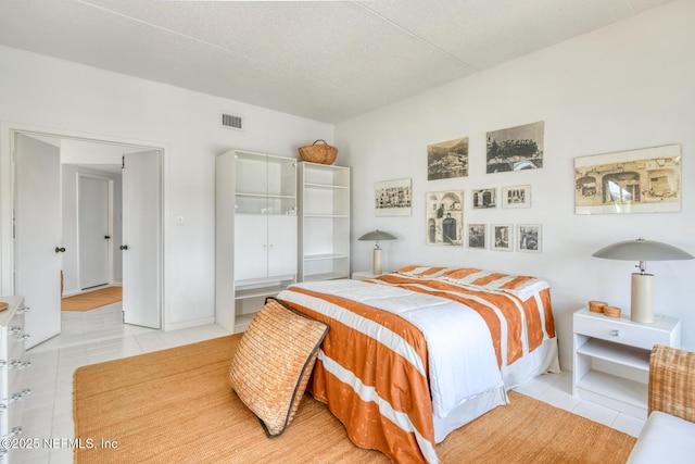 3115 Harbor Dr, Saint Augustine, FL 32084 - bedroom with light tile patterned flooring