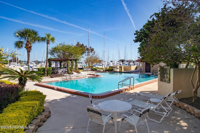 3115 Harbor Dr, Saint Augustine, FL 32084 - community pool featuring a patio
