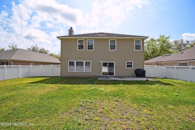 1691 Canopy Oaks Dr, Orange Park, FL 32065 - rear view of house featuring a patio area and a chimney