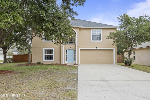 172 King Arthur Ct, Saint Augustine, FL 32086 - view of front of home featuring an attached garage, concrete driveway, stucco siding, and a shingled roof