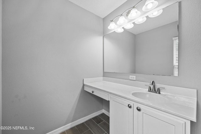 172 King Arthur Ct, Saint Augustine, FL 32086 - bathroom with vanity, baseboards, and wood tiled floors