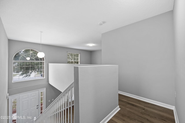 172 King Arthur Ct, Saint Augustine, FL 32086 - corridor featuring an upstairs landing, wood finished floors, and baseboards