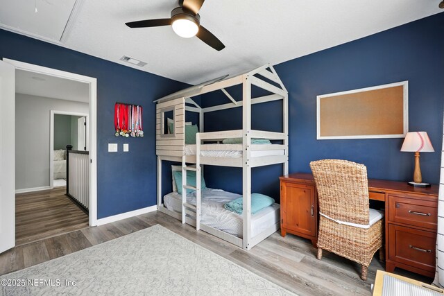 309 Elza Ln, Saint Augustine, FL 32086 - bedroom featuring light wood-type flooring and baseboards