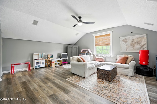 309 Elza Ln, Saint Augustine, FL 32086 - living room featuring a textured ceiling, lofted ceiling, wood finished floors, and a ceiling fan