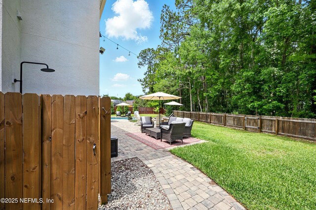 309 Elza Ln, Saint Augustine, FL 32086 - view of yard with outdoor lounge area and a patio