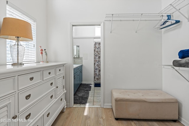5473 Pelican Way, Saint Augustine, FL 32080 - walk in closet with light wood finished floors