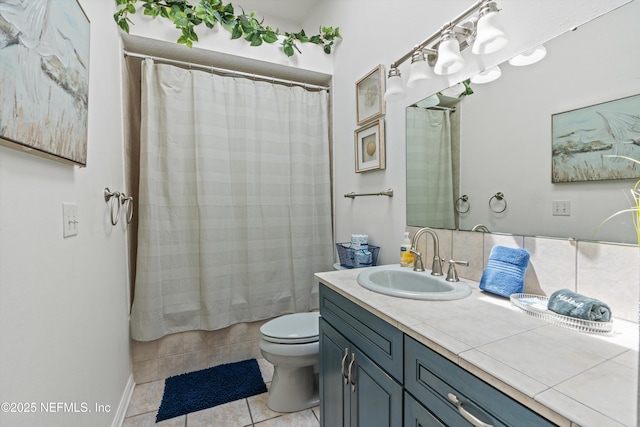 5473 Pelican Way, Saint Augustine, FL 32080 - full bath featuring vanity, toilet, and tile patterned floors