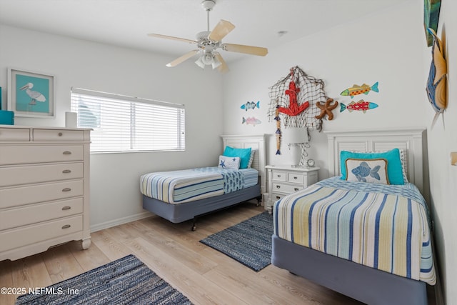 5473 Pelican Way, Saint Augustine, FL 32080 - bedroom featuring light wood-type flooring, a ceiling fan, and baseboards