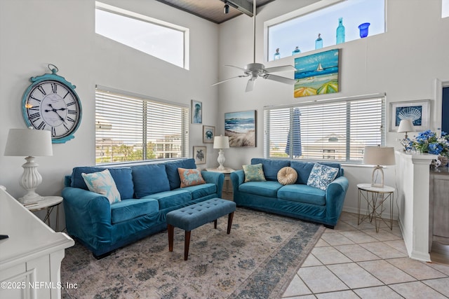 5473 Pelican Way, Saint Augustine, FL 32080 - living area with a towering ceiling, plenty of natural light, light tile patterned floors, and ceiling fan