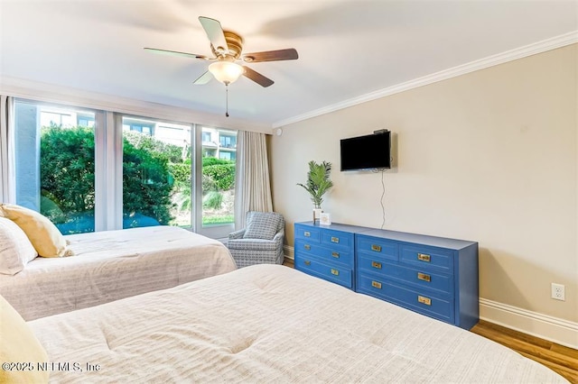 1185 Beach Walker Rd Unit 1185, Fernandina Beach, FL 32034 - bedroom featuring baseboards, crown molding, wood finished floors, and a ceiling fan