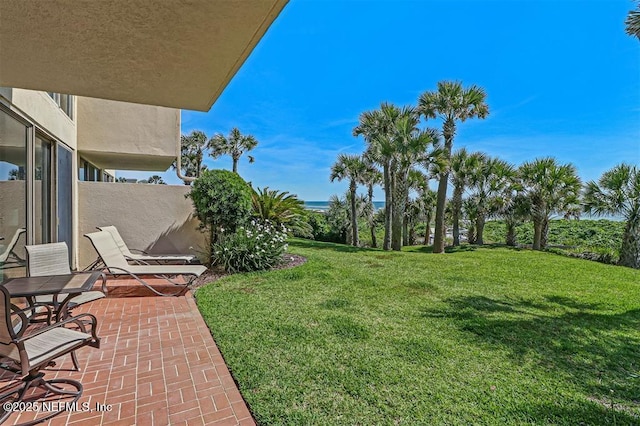 1185 Beach Walker Rd Unit 1185, Fernandina Beach, FL 32034 - view of grassy yard featuring a patio