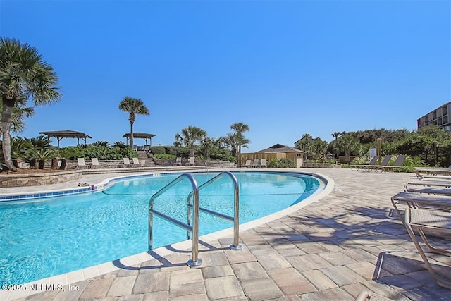 1185 Beach Walker Rd Unit 1185, Fernandina Beach, FL 32034 - community pool featuring a patio area
