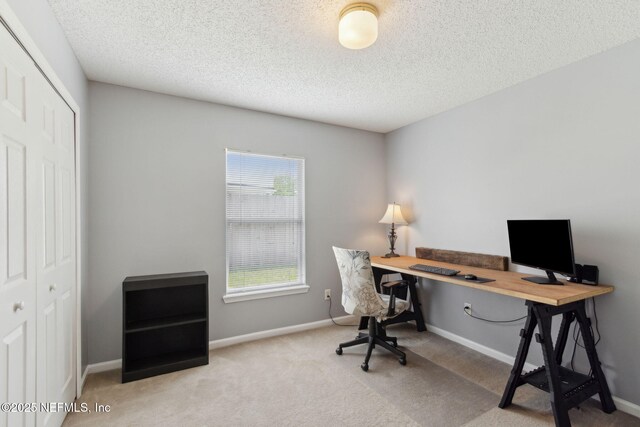 2000 Belhaven Dr, Orange Park, FL 32065 - carpeted office featuring a textured ceiling and baseboards