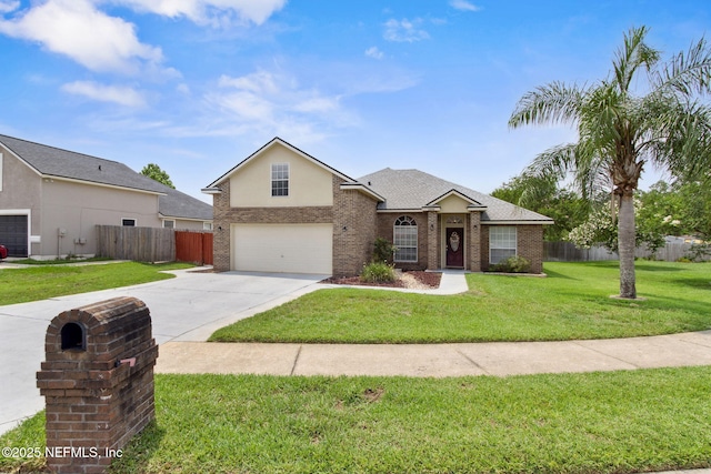 2000 Belhaven Dr, Orange Park, FL 32065 - view of front facade with concrete driveway, an attached garage, brick siding, and a shingled roof