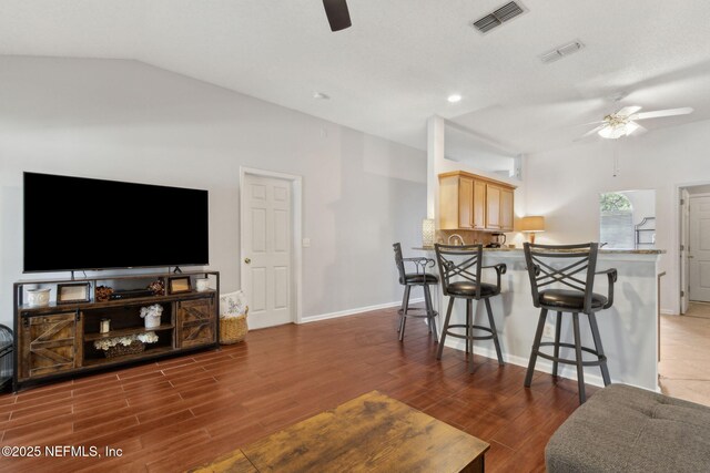 2000 Belhaven Dr, Orange Park, FL 32065 - living area with a ceiling fan, wood finished floors, baseboards, and lofted ceiling