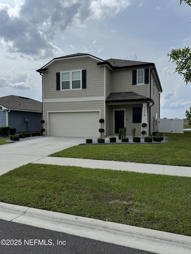 2358 Evening Oaks Ln, Green Cove Springs, FL 32043 - view of front of house featuring an attached garage and concrete driveway