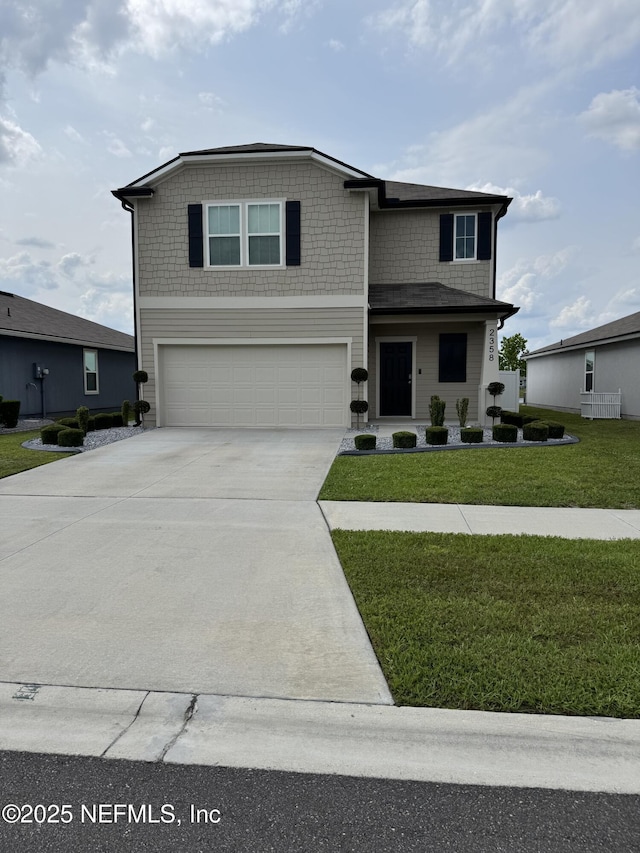 2358 Evening Oaks Ln, Green Cove Springs, FL 32043 - view of front of property with an attached garage, concrete driveway, and a front yard