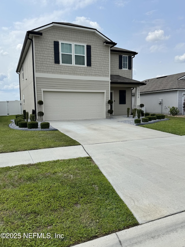 2358 Evening Oaks Ln, Green Cove Springs, FL 32043 - traditional home featuring a garage and driveway