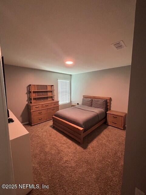 2358 Evening Oaks Ln, Green Cove Springs, FL 32043 - bedroom with light colored carpet