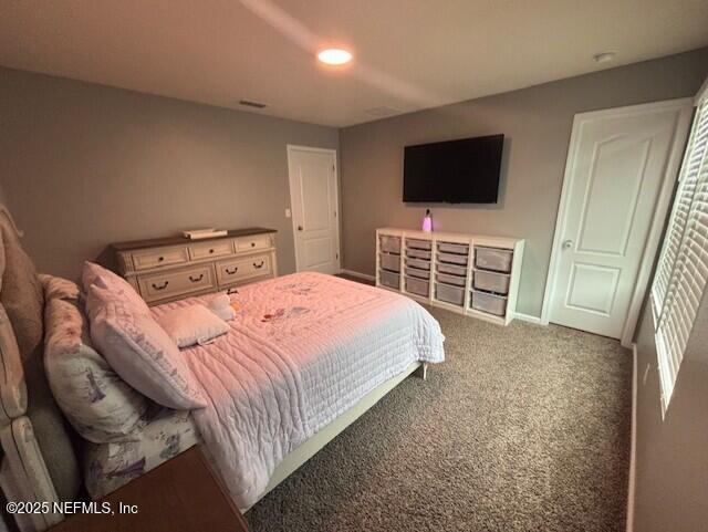 2358 Evening Oaks Ln, Green Cove Springs, FL 32043 - carpeted bedroom with baseboards and recessed lighting