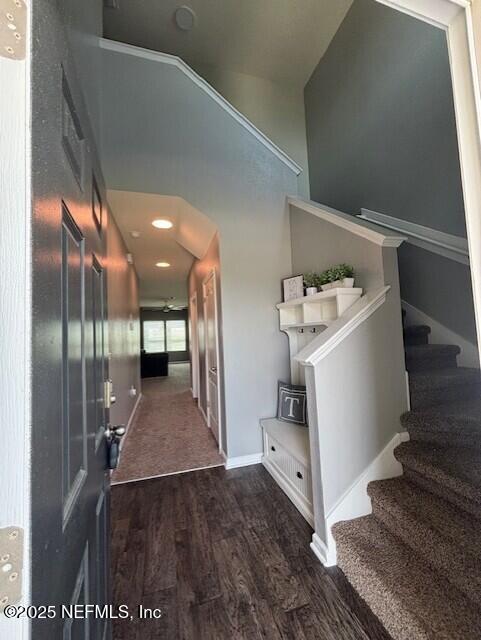 2358 Evening Oaks Ln, Green Cove Springs, FL 32043 - stairway with wood finished floors, high vaulted ceiling, and baseboards