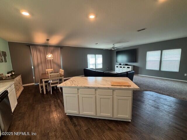2358 Evening Oaks Ln, Green Cove Springs, FL 32043 - kitchen with open floor plan, white cabinetry, light countertops, ceiling fan, and black dishwasher