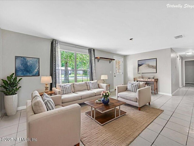 2704 Tina Ln, Middleburg, FL 32068 - living area with light tile patterned flooring and baseboards