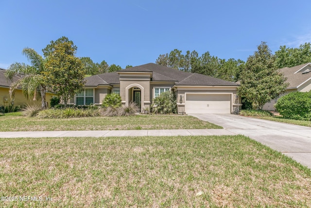 117 S Durbin Pkwy, Saint Johns, FL 32259 - view of front of property featuring an attached garage, stucco siding, concrete driveway, and a front yard