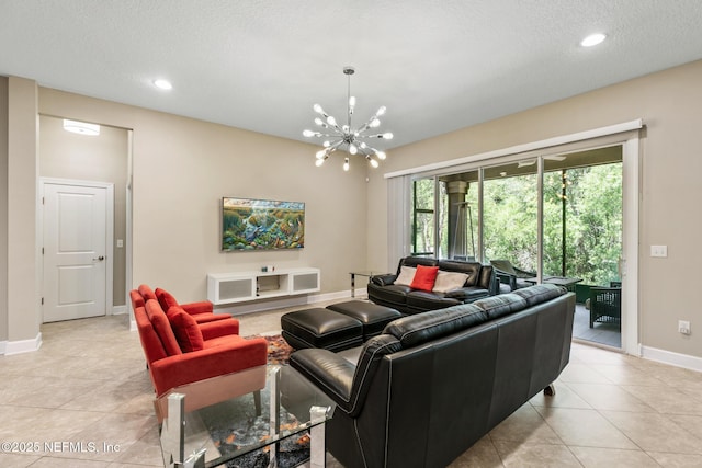 117 S Durbin Pkwy, Saint Johns, FL 32259 - living room with a chandelier, light tile patterned floors, baseboards, recessed lighting, and a textured ceiling